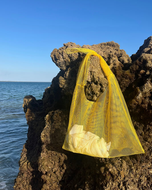 Saco de praia solidário